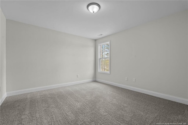 60 Bennett Rd, Coats, NC 27521 - carpeted empty room featuring baseboards