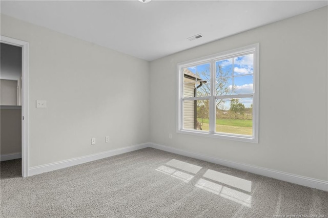 60 Bennett Rd, Coats, NC 27521 - unfurnished bedroom featuring carpet floors and baseboards