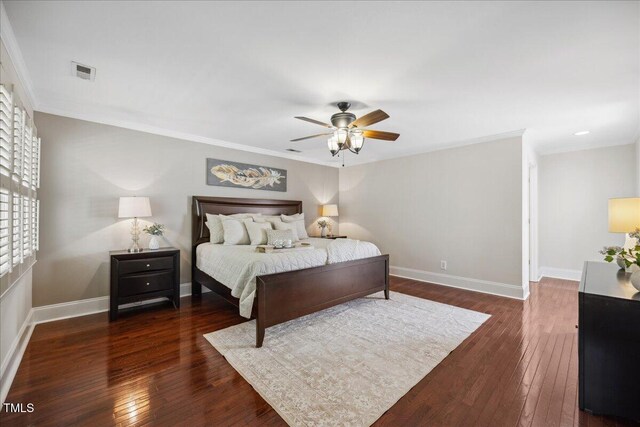 2725 Rosedale Ave, Raleigh, NC 27607 - bedroom with crown molding, dark wood-style floors, baseboards, and a ceiling fan