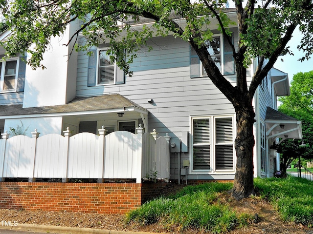 1402 Barton Place Dr, Raleigh, NC 27608 - back of house featuring a shingled roof