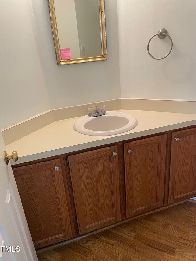 1402 Barton Place Dr, Raleigh, NC 27608 - bathroom with vanity and wood finished floors