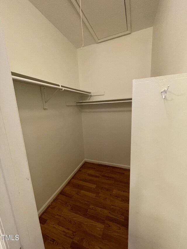 1402 Barton Place Dr, Raleigh, NC 27608 - walk in closet featuring wood finished floors
