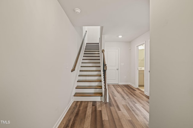 5430 Crescent Square St, Raleigh, NC 27616 - stairs featuring wood finished floors and baseboards