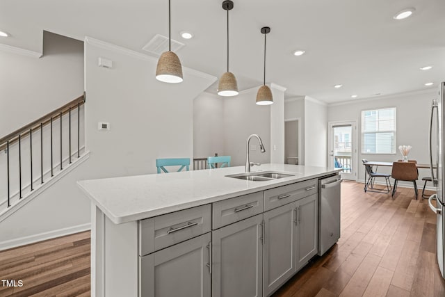 5430 Crescent Square St, Raleigh, NC 27616 - kitchen with a sink, dishwasher, ornamental molding, recessed lighting, and an island with sink