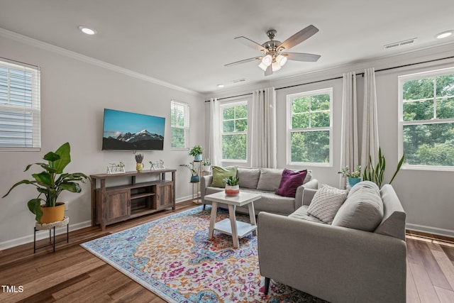 5430 Crescent Square St, Raleigh, NC 27616 - living area with crown molding, baseboards, wood finished floors, a ceiling fan, and recessed lighting