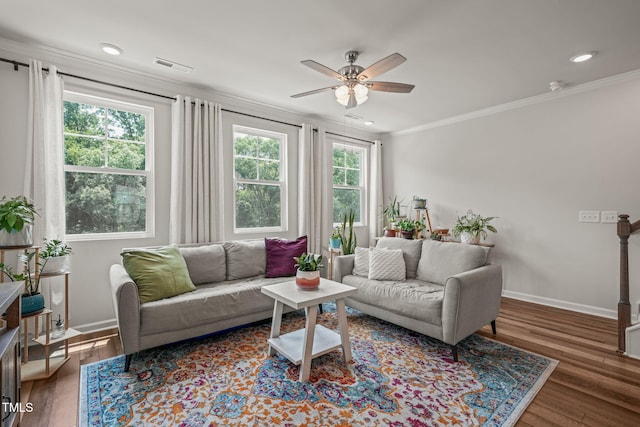 5430 Crescent Square St, Raleigh, NC 27616 - living area featuring baseboards, crown molding, a ceiling fan, wood finished floors, and recessed lighting