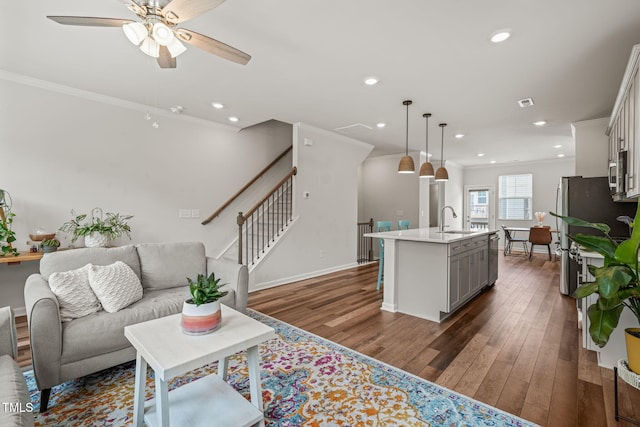 5430 Crescent Square St, Raleigh, NC 27616 - living area with ornamental molding, ceiling fan, baseboards, dark wood-style flooring, and recessed lighting