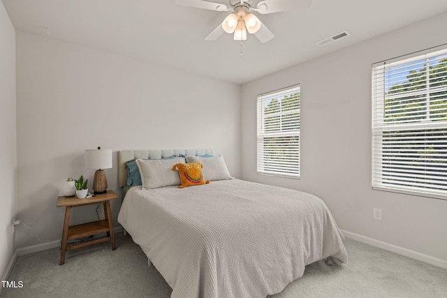 5430 Crescent Square St, Raleigh, NC 27616 - bedroom featuring baseboards, multiple windows, and carpet flooring