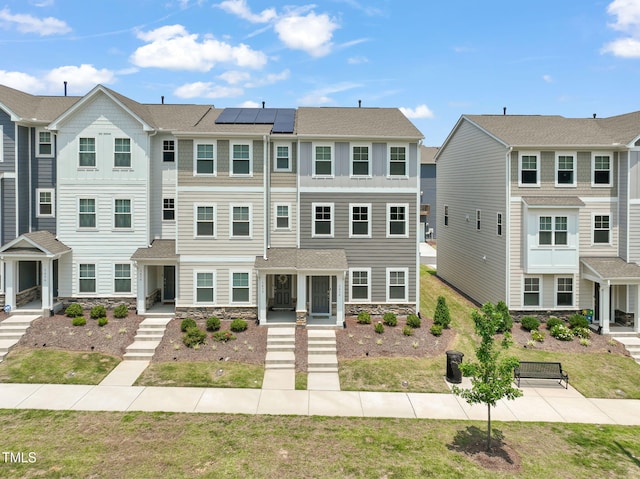 5430 Crescent Square St, Raleigh, NC 27616 - view of property with stone siding and solar panels