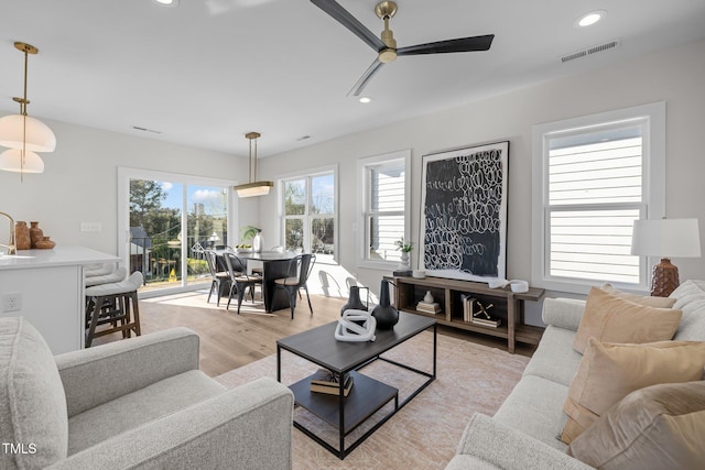 517 Coleman St, Raleigh, NC 27610 - living area with recessed lighting, ceiling fan, and light wood-style floors