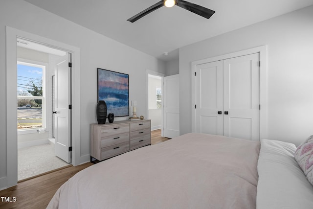 517 Coleman St, Raleigh, NC 27610 - bedroom with wood finished floors, baseboards, a closet, ensuite bath, and a ceiling fan