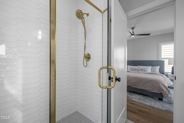 517 Coleman St, Raleigh, NC 27610 - ensuite bathroom with a shower stall, wood finished floors, and ceiling fan