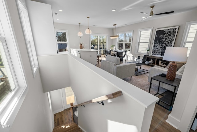 517 Coleman St, Raleigh, NC 27610 - stairs featuring plenty of natural light, wood finished floors, recessed lighting, and a ceiling fan