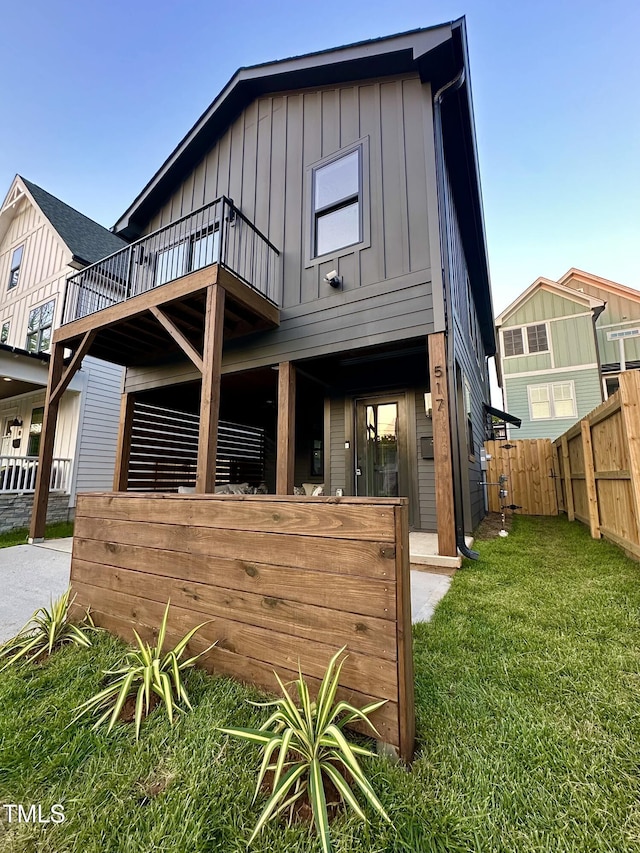 517 Coleman St, Raleigh, NC 27610 - rear view of house featuring board and batten siding