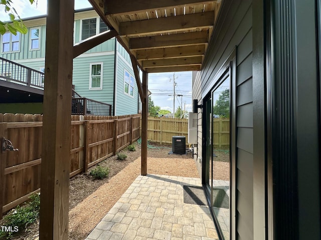 517 Coleman St, Raleigh, NC 27610 - fenced backyard with a patio and central AC unit