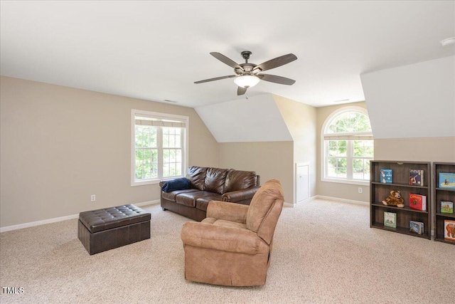 904 Oldwyck Dr, Fuquay Varina, NC 27526 - carpeted living area with baseboards, a ceiling fan, and vaulted ceiling