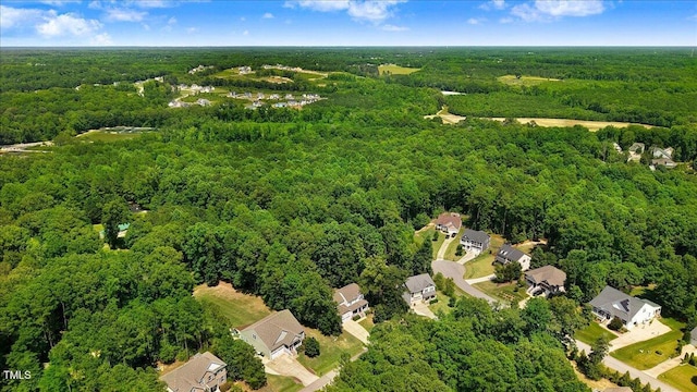 1304 Double Oak Ln, Willow Springs, NC 27592 - aerial view of property's location with a heavily wooded area and nearby suburban area