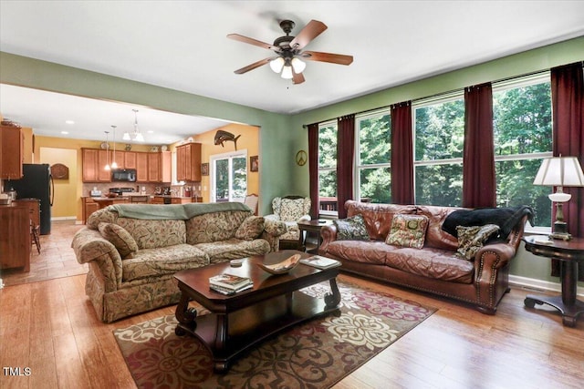 1304 Double Oak Ln, Willow Springs, NC 27592 - living room with ceiling fan and light wood finished floors