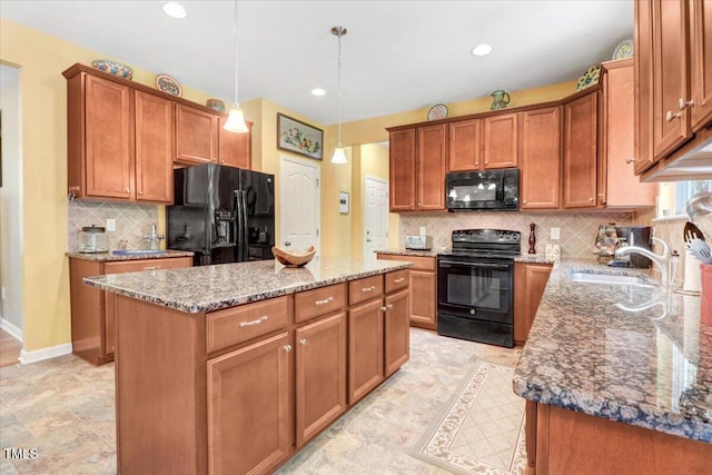 1304 Double Oak Ln, Willow Springs, NC 27592 - kitchen with black appliances, a sink, light stone counters, a kitchen island, and backsplash