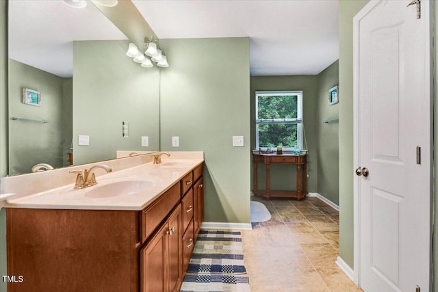 1304 Double Oak Ln, Willow Springs, NC 27592 - full bath with double vanity and baseboards