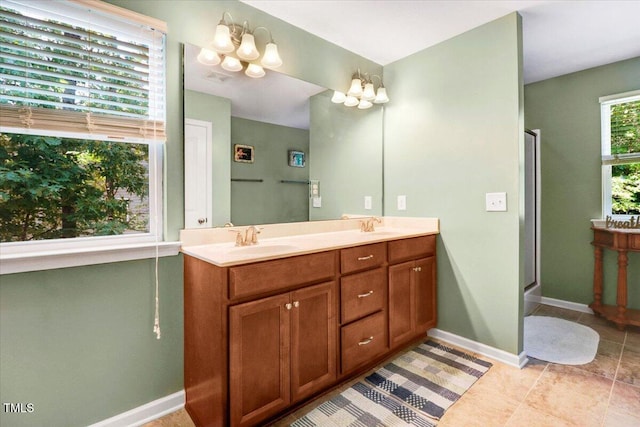 1304 Double Oak Ln, Willow Springs, NC 27592 - full bath featuring double vanity, baseboards, a shower with door, a chandelier, and tile patterned flooring