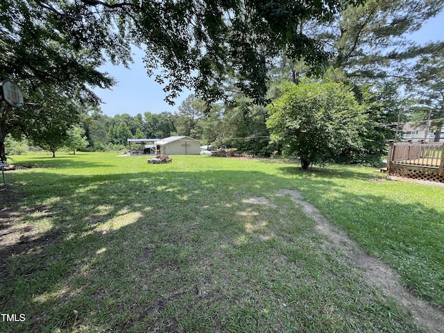 2433 Zacks Mill Rd, Angier, NC 27501 - view of green lawn with a wooden deck