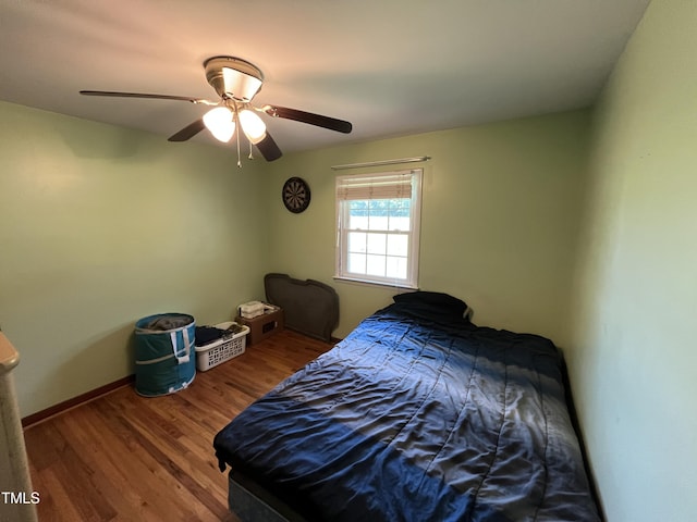 2433 Zacks Mill Rd, Angier, NC 27501 - bedroom with a ceiling fan and wood finished floors