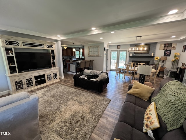 2433 Zacks Mill Rd, Angier, NC 27501 - living area with crown molding, wood finished floors, and recessed lighting
