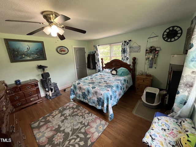 2433 Zacks Mill Rd, Angier, NC 27501 - bedroom with wood finished floors, a ceiling fan, and a textured ceiling