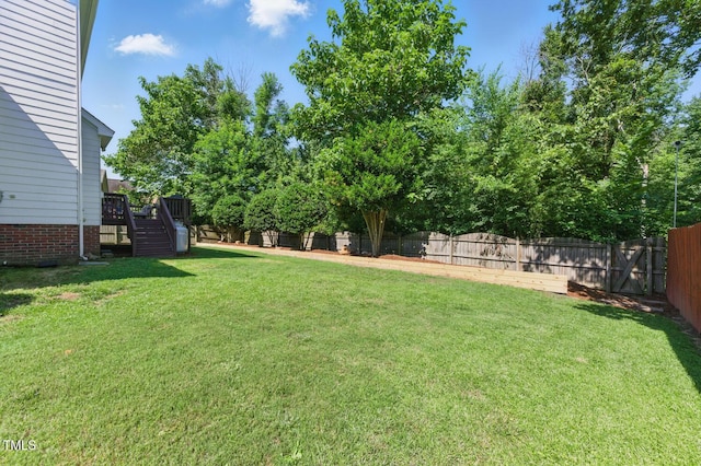2933 Creek Moss Ave, Wake Forest, NC 27587 - fenced backyard with stairs and a wooden deck