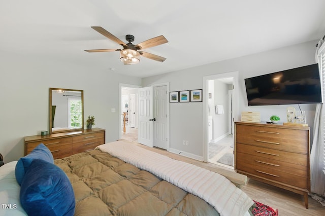 2933 Creek Moss Ave, Wake Forest, NC 27587 - bedroom with light wood-type flooring and a ceiling fan