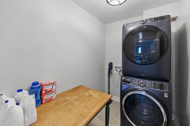 2933 Creek Moss Ave, Wake Forest, NC 27587 - laundry room with estacked washer and dryer and tile patterned floors
