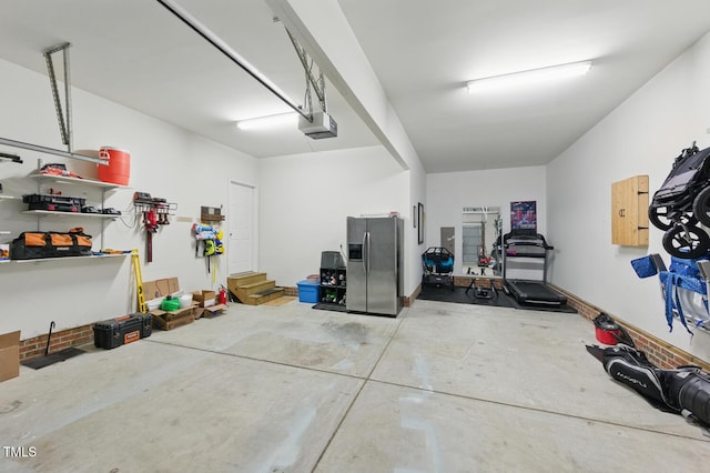 2933 Creek Moss Ave, Wake Forest, NC 27587 - garage featuring stainless steel fridge with ice dispenser
