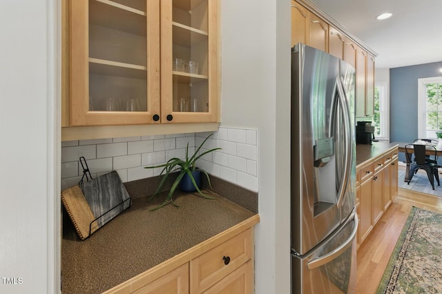 2933 Creek Moss Ave, Wake Forest, NC 27587 - kitchen with stainless steel fridge, light brown cabinets, glass insert cabinets, light wood finished floors, and recessed lighting
