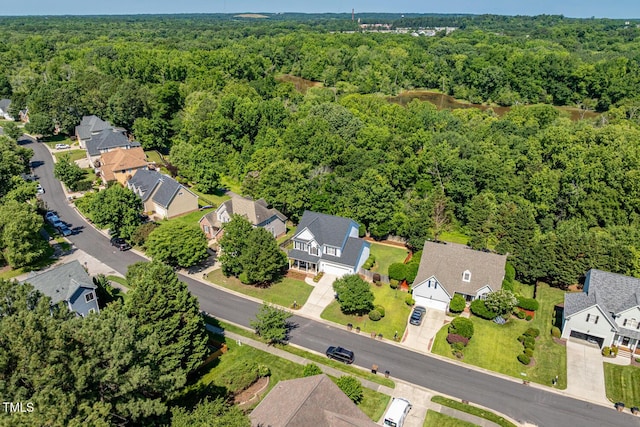 2933 Creek Moss Ave, Wake Forest, NC 27587 - aerial view of residential area featuring a heavily wooded area
