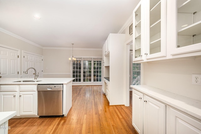 7605 Sandy Lake Ct, Raleigh, NC 27613 - kitchen with dishwasher, ornamental molding, light wood-style floors, and white cabinetry