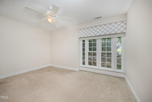 7605 Sandy Lake Ct, Raleigh, NC 27613 - carpeted spare room featuring baseboards and a ceiling fan