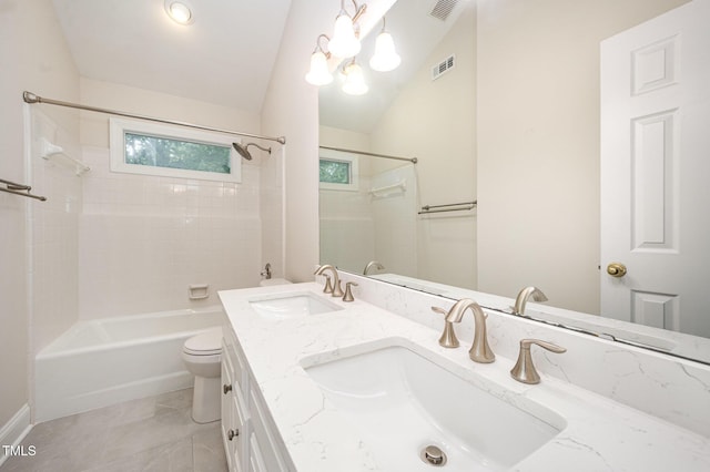 7605 Sandy Lake Ct, Raleigh, NC 27613 - full bathroom featuring shower / tub combination, double vanity, vaulted ceiling, and tile patterned flooring