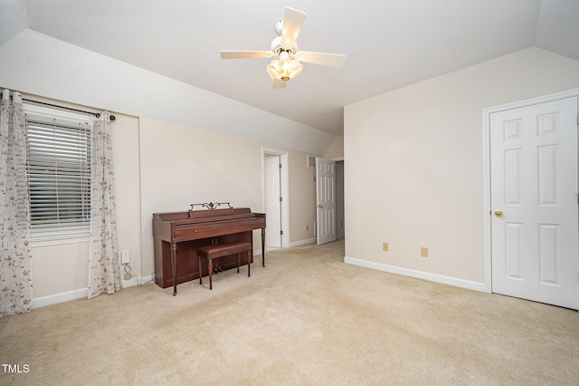 7605 Sandy Lake Ct, Raleigh, NC 27613 - living area with vaulted ceiling, light colored carpet, and a ceiling fan