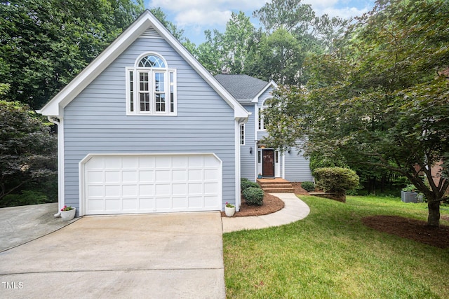 7605 Sandy Lake Ct, Raleigh, NC 27613 - traditional-style home with driveway, a front lawn, and an attached garage