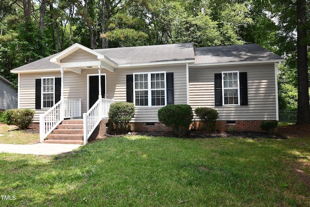 5949 Sandy Run, Knightdale, NC 27545 - single story home featuring crawl space, a front lawn, a shingled roof, and view of wooded area