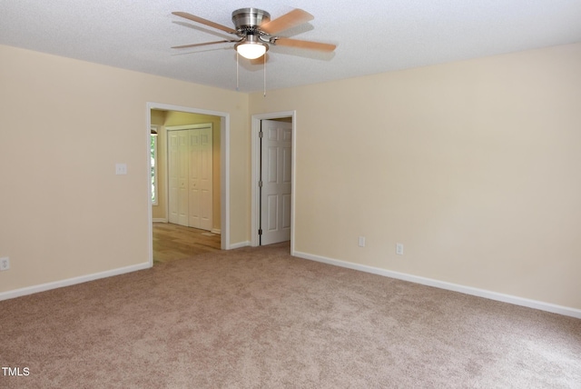 5949 Sandy Run, Knightdale, NC 27545 - unfurnished room with a ceiling fan, carpet, and baseboards