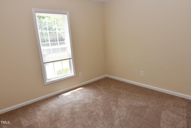 5949 Sandy Run, Knightdale, NC 27545 - carpeted spare room featuring baseboards