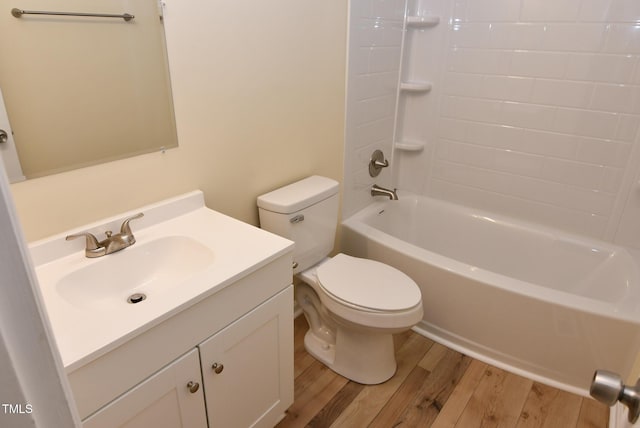 5949 Sandy Run, Knightdale, NC 27545 - full bathroom with wood finished floors, toilet, vanity, and  shower combination