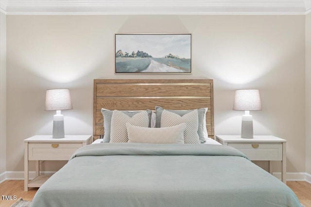 4724 Ludwell Branch Ct, Raleigh, NC 27612 - bedroom featuring baseboards, crown molding, and wood finished floors