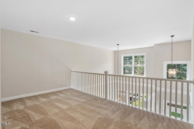 4724 Ludwell Branch Ct, Raleigh, NC 27612 - spare room with carpet flooring, a chandelier, and baseboards