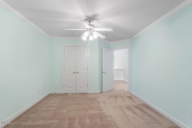 4724 Ludwell Branch Ct, Raleigh, NC 27612 - unfurnished bedroom with ornamental molding, carpet flooring, baseboards, a closet, and a ceiling fan