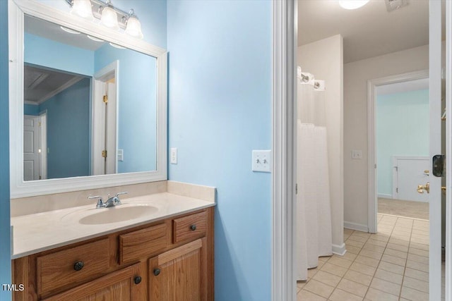 4724 Ludwell Branch Ct, Raleigh, NC 27612 - bathroom with vanity, tile patterned floors, and baseboards