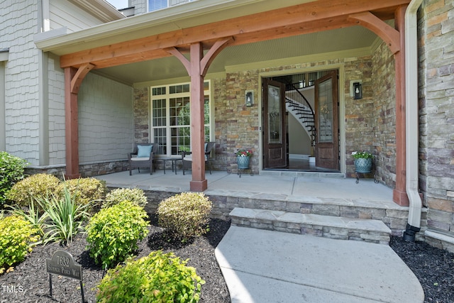 7632 Summer Pines Way, Wake Forest, NC 27587 - view of exterior entry featuring a porch and stone siding