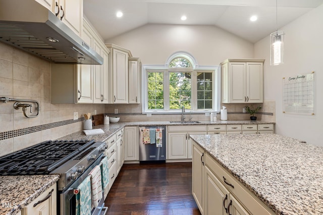 7632 Summer Pines Way, Wake Forest, NC 27587 - kitchen with appliances with stainless steel finishes, under cabinet range hood, light stone counters, dark wood-style floors, and decorative backsplash